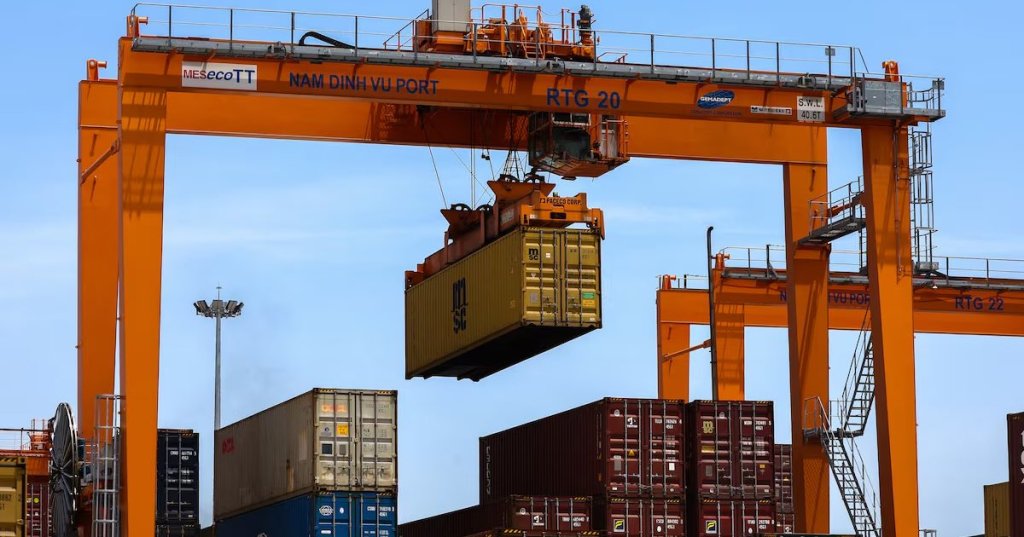 A container is loaded onto a cargo ship while docked at Hai Phong port, in Hai Phong, Vietnam, April 16, 2025. REUTERS/Athit Perawongmetha/File Photo