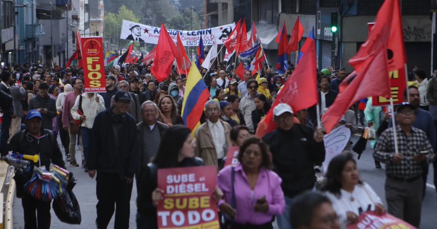 Demonstrators march during a protest against a diesel subsidy cut, near the Carondelet Palace in Quito on Sept. 23. Photographer: David Diaz Arcos/Bloomberg