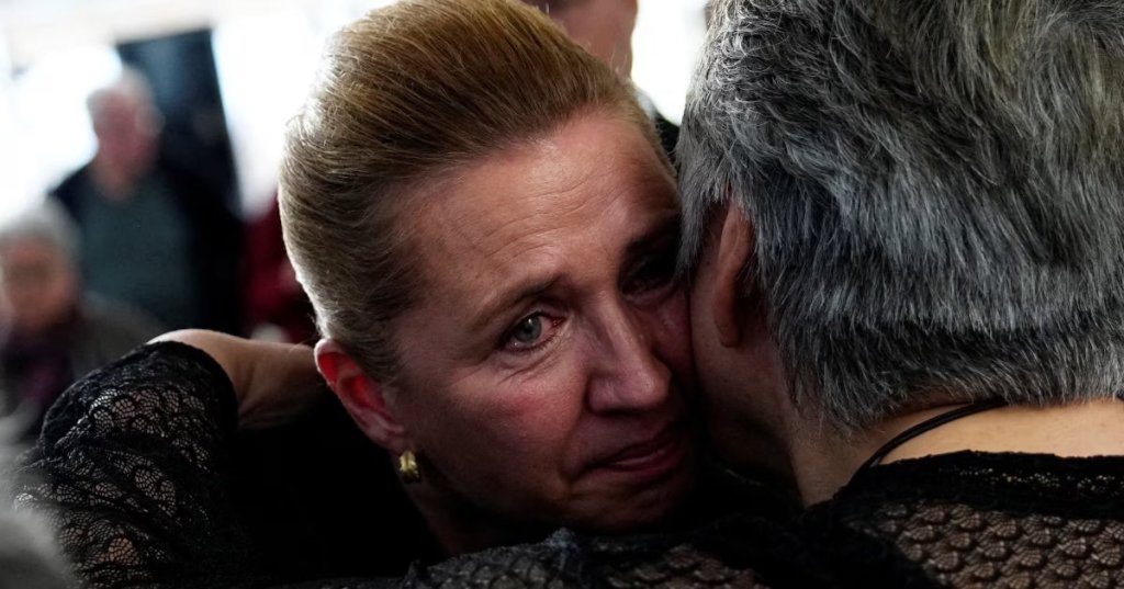 Denmark's Prime Minister Mette Frederiksen and Greenland's Prime Minister Jens-Frederik Nielsen greet and apologise to women affected after a meeting in the cultural centre in Nuuk, Greenland, September 24, 2025. Ritzau Scanpix/Mads Claus..