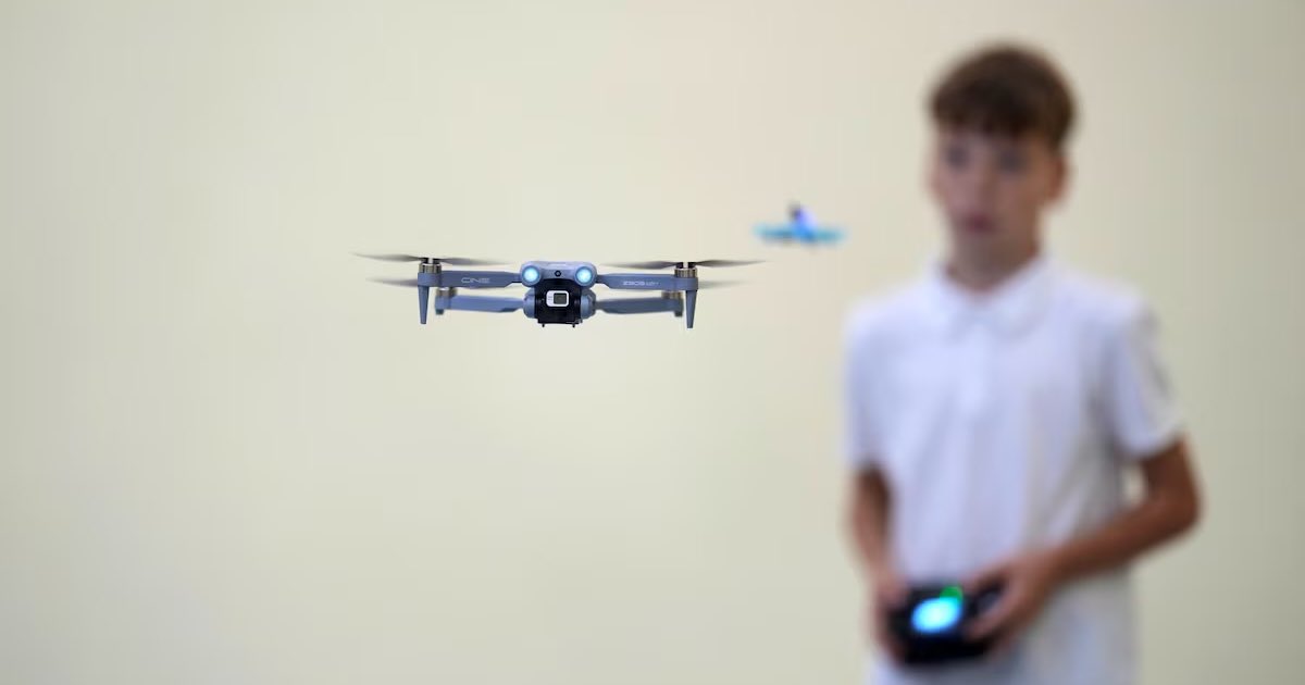 Drones fly during Air Tech, a national drone education initiative launched in Taurage, Lithuania September 16, 2025. REUTERS/Ints Kalnin