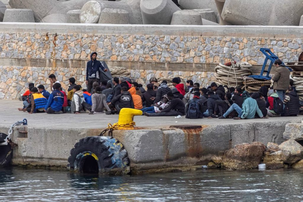 Migrants gather at the port of the village of Sfakia, following a rescue operation at open sea, on the island of Crete, Greece, May 8, 2025. REUTERS/Nicolas Economou/File Photo