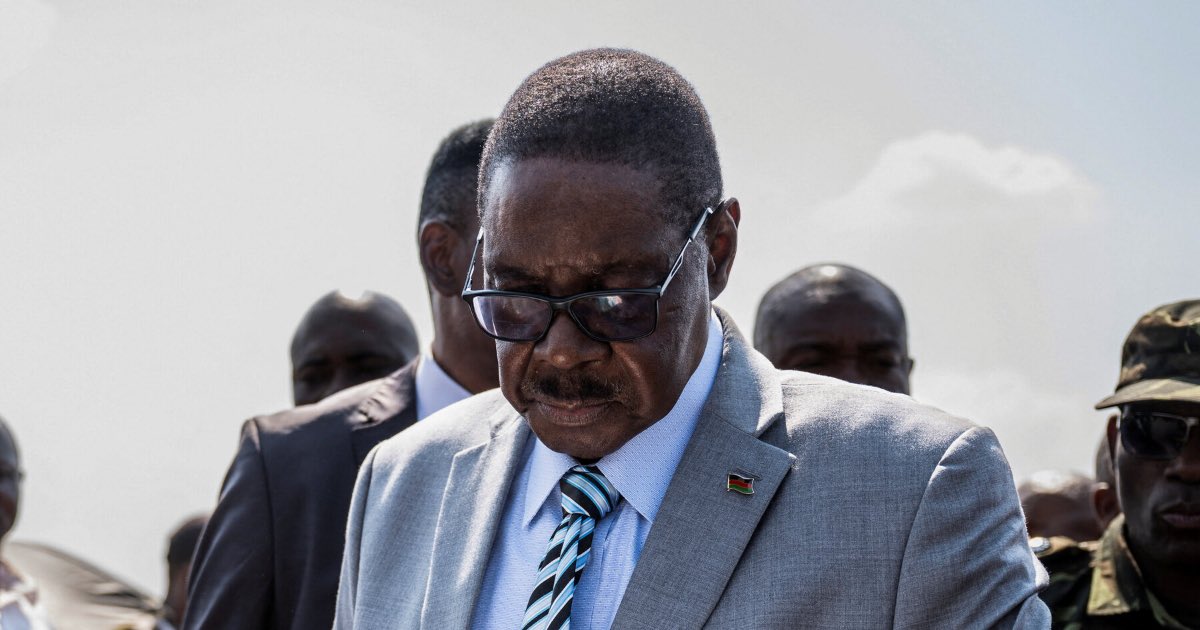 Peter Mutharika, leader of the Democratic Progressive Party, reading a ballot at a polling station in Malawi's Thyolo district on Tuesday. Reuters