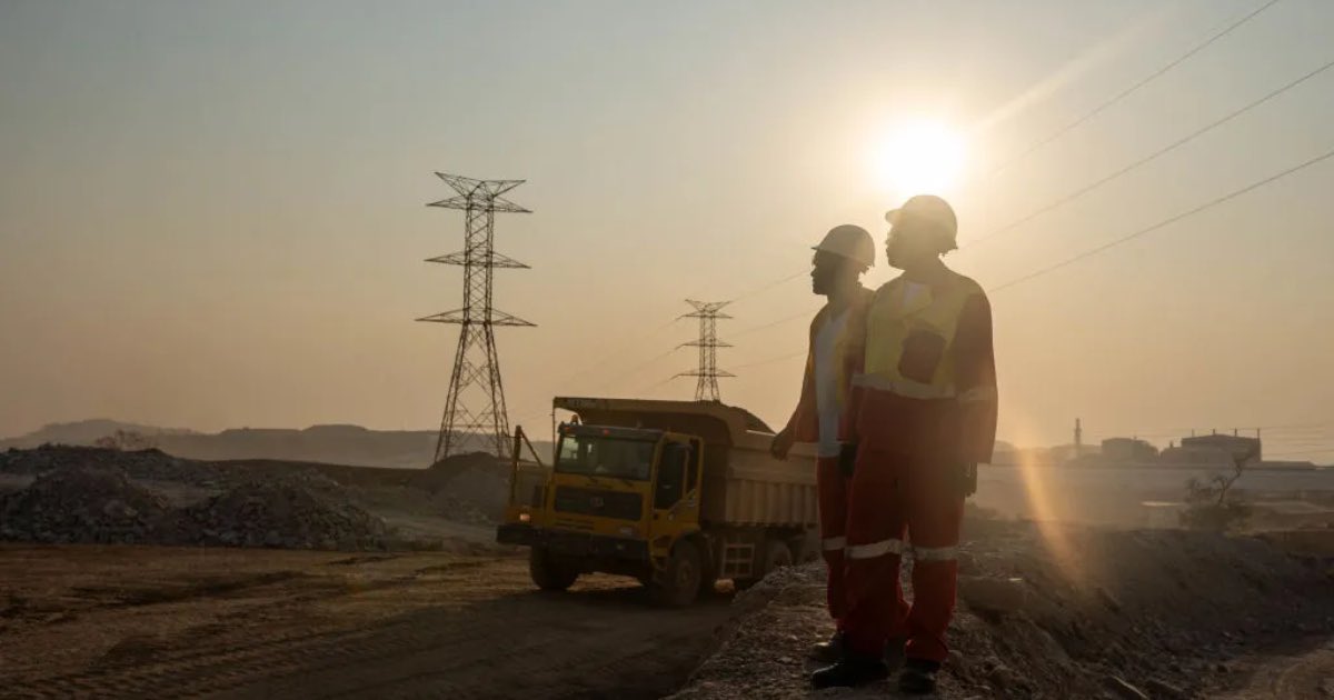 Workers direct traffic from a copper and cobalt mine in southeastern Democratic Republic of Congo.Photographer: Emmet Livingstone/AFP/GEtty Images