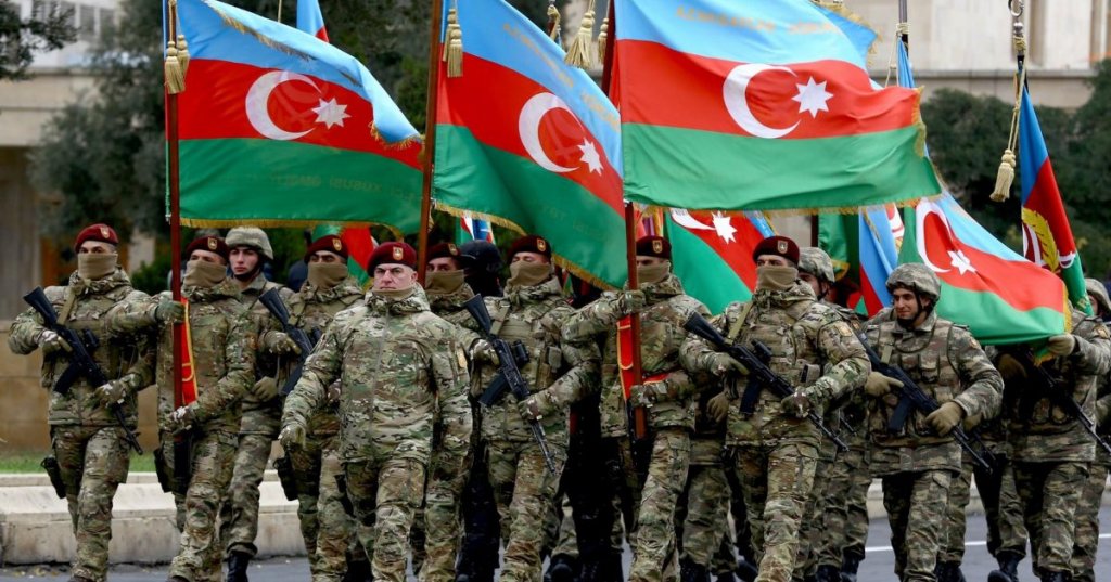 This image shows servicemen of the Azerbaijani Armed Forces marching in a military parade in Azerbaijan - (Photo credit . Eurasia.travel)