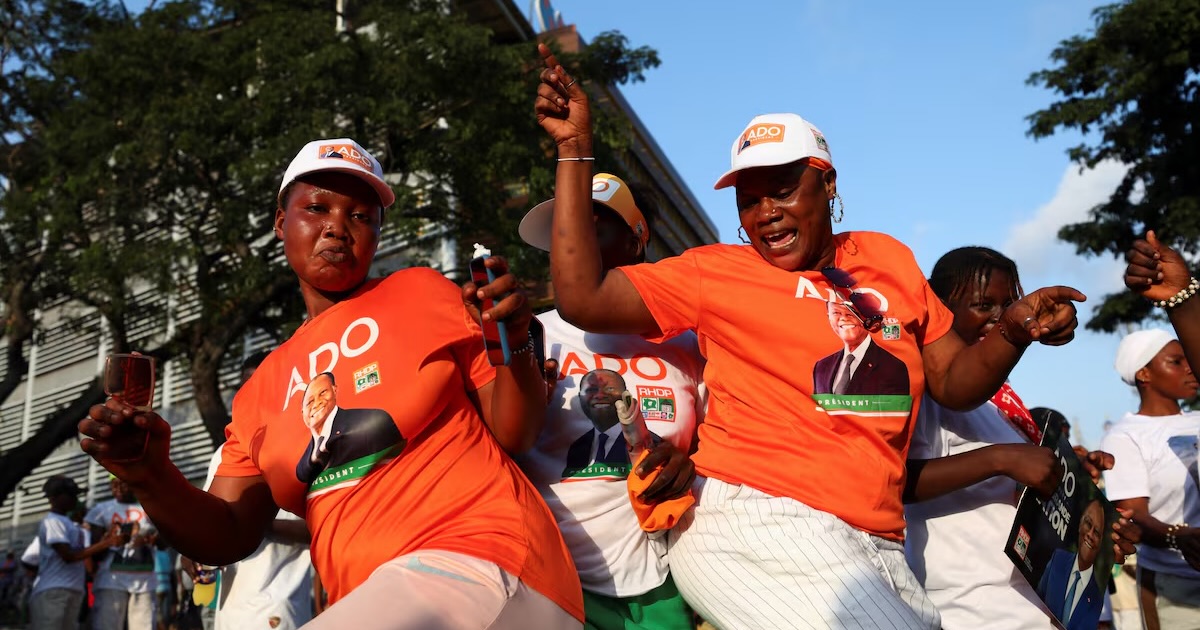 Supporters of Ivorian president Alassane Ouattara, 83, gather for a final political rally ahead of Ivory Coast’s presidential election, scheduled for October 25, in Abidjan, Ivory Coast, October 23, 2025. REUTERS/Francis Kokoroko