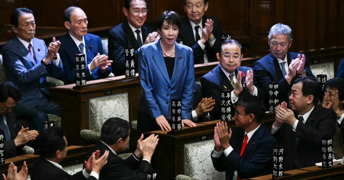 Ms. Takaichi acknowledging the applause after she was elected as Japan’s new prime minister during an extraordinary session of Parliament in Tokyo on Tuesday (Oct. 21). Credit... Philip Fong-Agence France-Presse — Getty Images