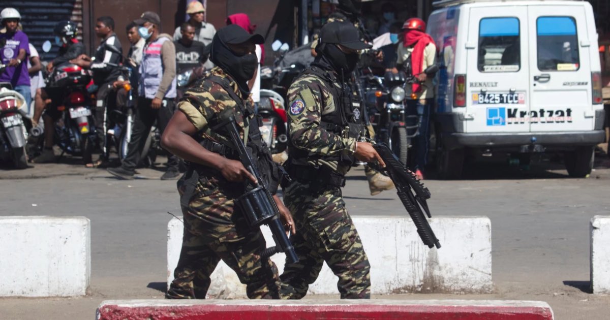 Police patrol the streets during a protest calling for the president to step down in Antananarivo, Madagascar, Thursday, Oct. 9, 2025. (AP Photo/Alexander Joe)