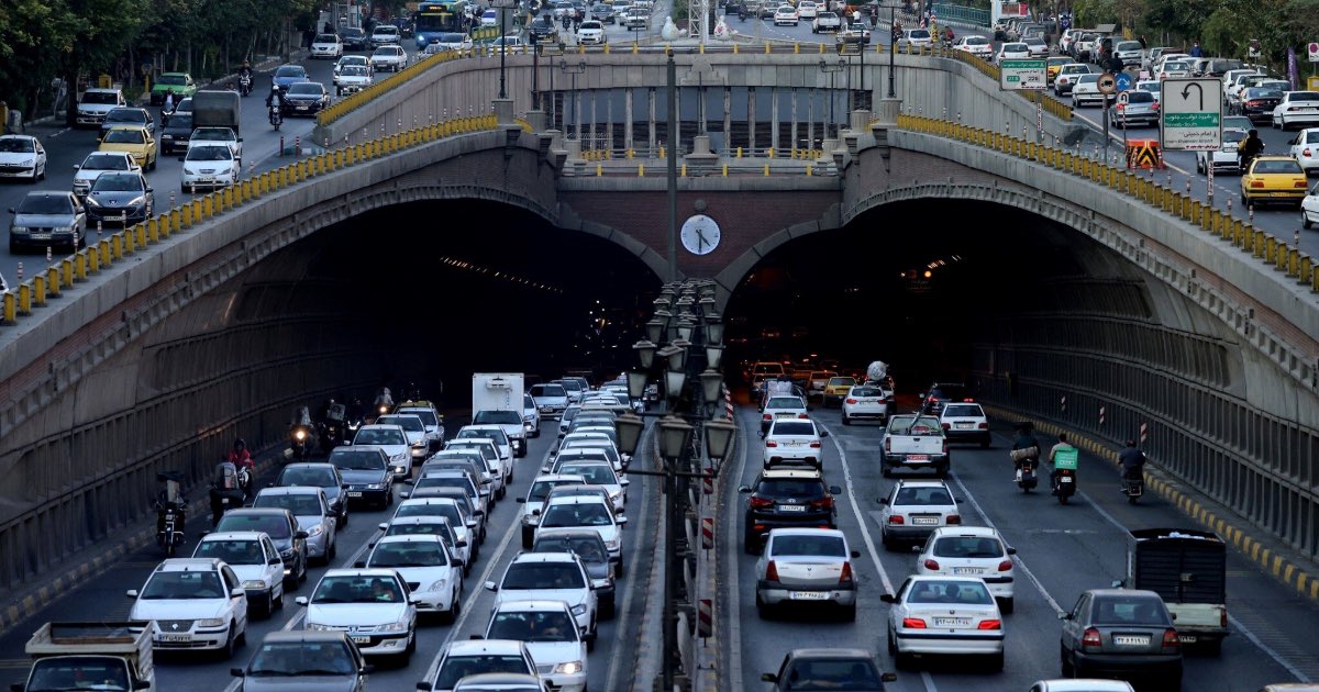 Commuters drive along the Nawab Highway underpass in Tehran on November 3, 2025. (ATTA KENARE / AFP)