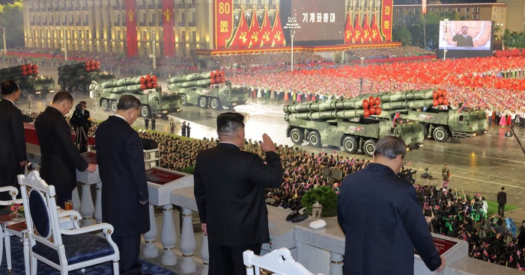 North Korean leader Kim Jong Un watches a military parade celebrating the 80th anniversary of the founding of the ruling Workers' Party of Korea (WPK), in Pyongyang, North Korea, in this pictured released October 11, 2025 by North Korea's official Korean Central News Agency. KCNA via REUTERS
