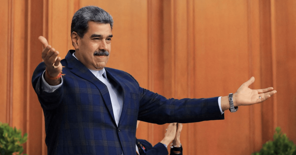 Venezuela's President Nicolas Maduro participates in an event with evangelical groups praying for peace, amid rising tensions with the U.S., at Miraflores Palace, in Caracas, Venezuela, November 18, 2025. Miraflores Palace/Handout via REUTERS