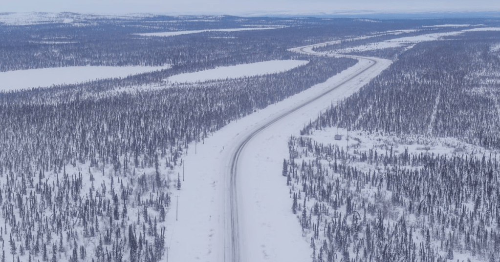 The Dempster highway is seen from the window of a CH-147F Chinook helicopter near Inuvik, Northwest Territories. Photograph: Cole Burston/AFP/Getty Images