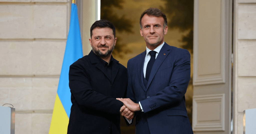 French President Emmanuel Macron shakes hands with Ukrainian President Volodymyr Zelenskiy after a joint press conference at the Elysee Palace in Paris, France, November 17, 2025. REUTERS/Sarah1