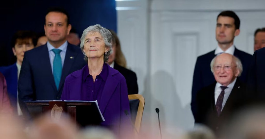 Catherine Connolly listens to the national anthem after her inauguration ceremony as Ireland's 10th President in Dublin Castle. Photograph: Clodagh Kilcoyne/PA Wire