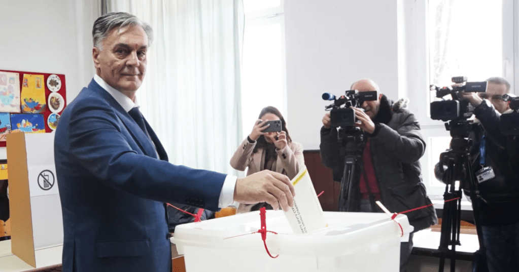 Sinisa Karan casts his ballot in a snap presidential election of Republika Srpska at a polling station in Banja Luka, northwest of Sarajevo, Bosnia, Sunday, Nov. 23, 2025. (AP Photo/Milivoje Pavicic)