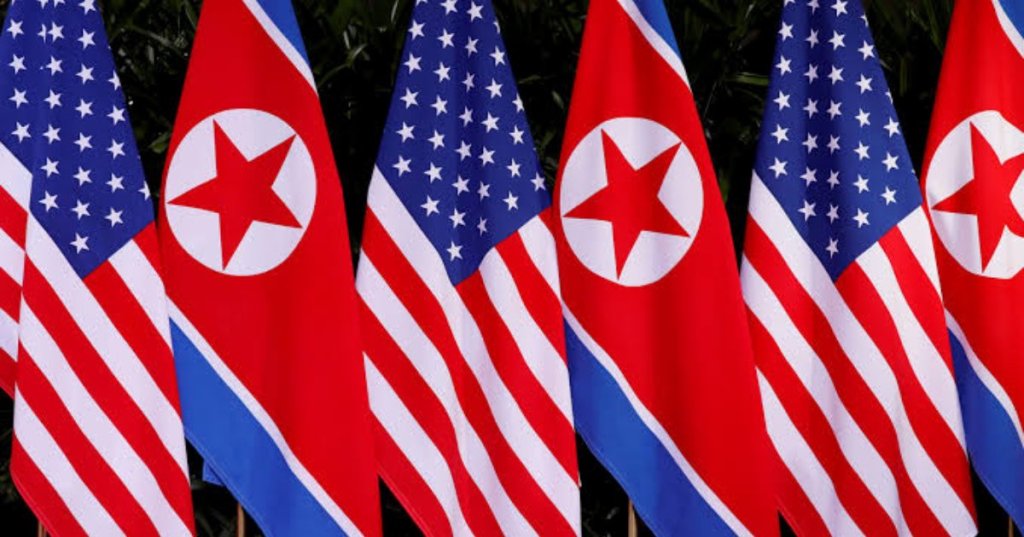 U.S. and North Korean national flags are seen at the Capella Hotel on Sentosa island in Singapore June 12, 2018. REUTERS/Jonathan Ernst