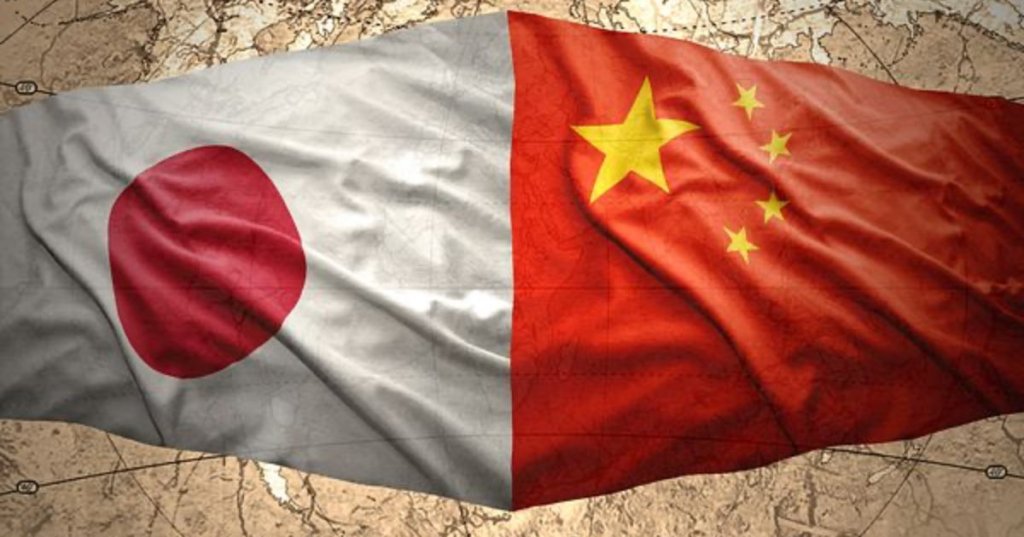 Credit: Chinese & Japanese Flags image via Shutterstock