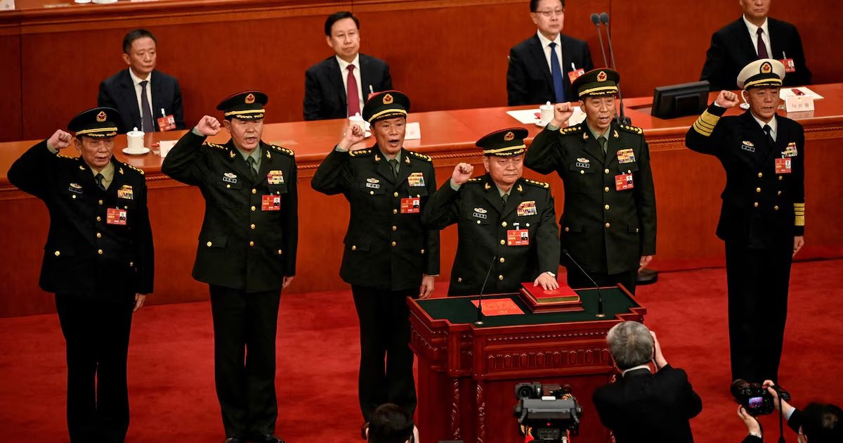 Zhang Youxia (front), newly-elected Vice Chairman of the Central Military Commission of the People's Republic of China, swears an oath with members of the Central Military Commission (L-R) Zhang Shengmin, Liu Zhenli, He Weidong, Li Shangfu, and Miao Hua, after they were elected during the fourth plenary session of the National People's Congress (NPC) at the Great Hall of the People in Beijing, China on March 11, 2023. GREG BAKER/Pool via REUTERS/File Photo