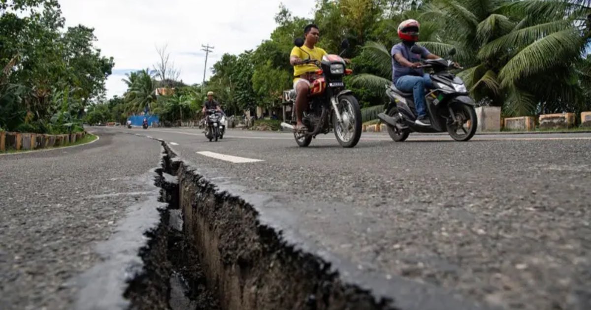 The aftermath of the earthquake is evident in Tabogon town, where a crack has emerged along a major highway