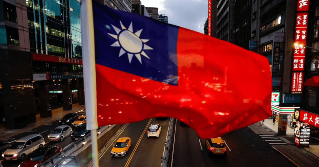 A Taiwan flag can be seen on an overpass ahead of National Day celebrations in Taipei, Taiwan, October 8, 2025. REUTERS/Ann Wang