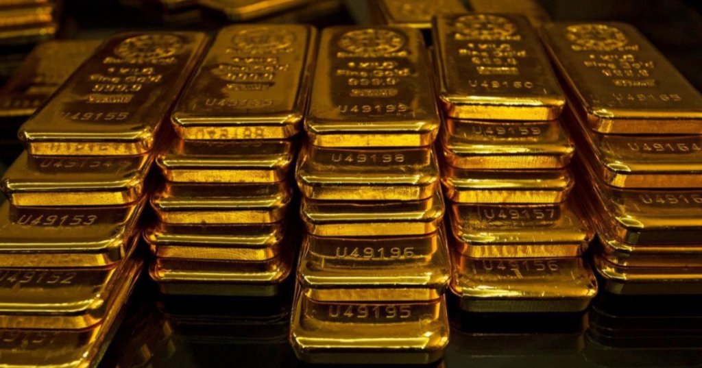 File photo shows stacks of gold bars stored in a vault. (Adobe Stock Photo)