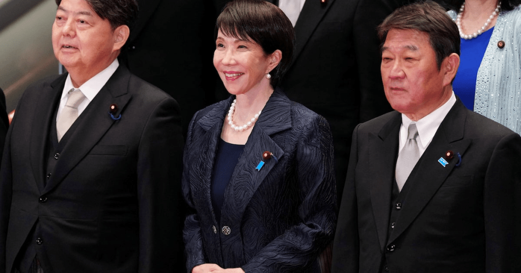 Japanese Prime Minister Sanae Takaichi (front C) and her new cabinet members pose for a group photo in Tokyo, Japan, Oct. 21, 2025. Jia Haocheng/Pool via REUTERS