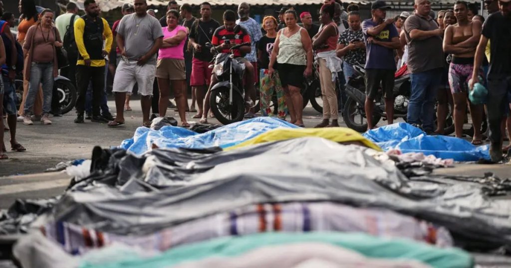 The bodies of people killed during the raid. Credit...Silvia Izquierdo-Associated Press