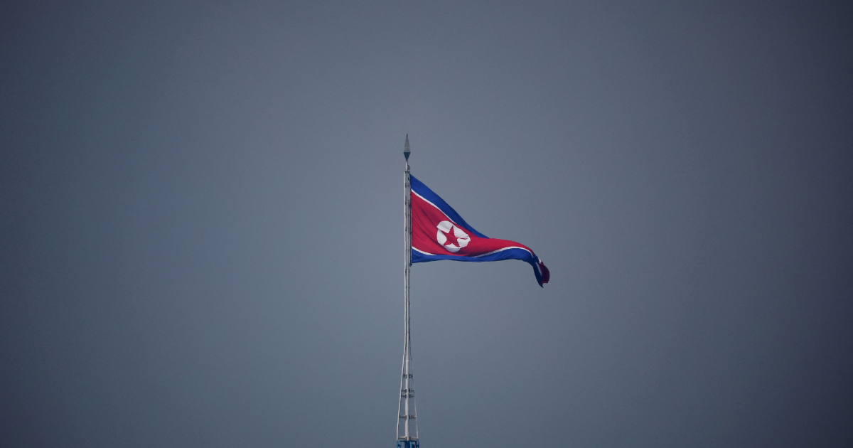 FILE PHOTO: A North Korean flag flutters near the truce village of Panmunjom inside the demilitarised zone separating the two Koreas.