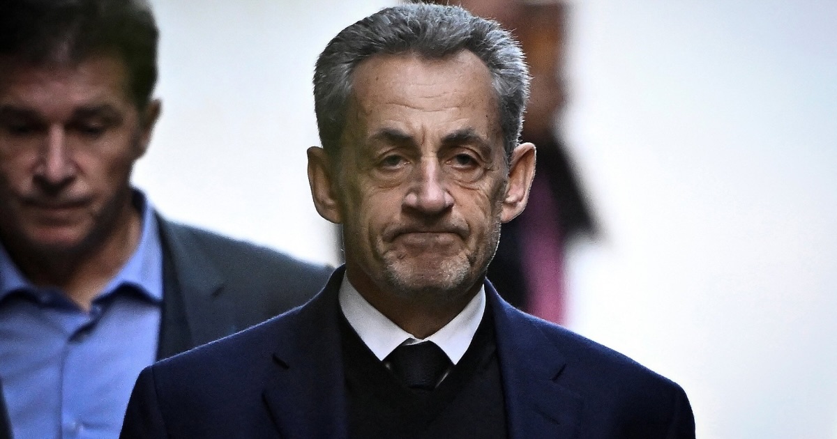 France's former president Nicolas Sarkozy leaves his residence to present himself to La Sante Prison for incarceration on a five-year prison sentence (JULIEN DE ROSA / AFP)
