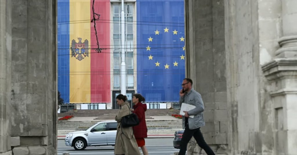 Moldovans voted in a landmark parliamentary election that could determine whether the country stays on course to join the European Union. | Artur Widak/Getty Images