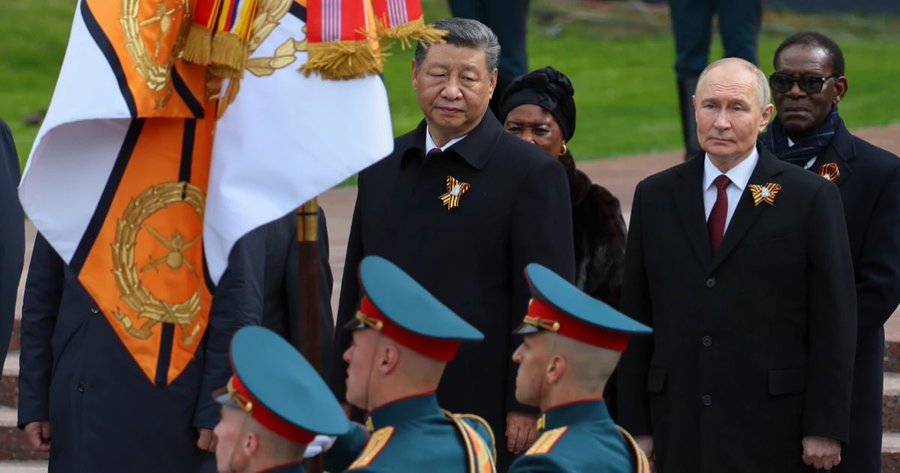 Chinese President Xi Jinping, centre, and Russian President Vladimir Putin, second from right, attend a wreath laying ceremony at the Tomb of the Unknown Soldier in Alexander Garden after the Victory Day military parade in Moscow, Russia, Friday, May 9, 2025, during celebrations of the 80th anniversary of the Soviet Union's victory over Nazi Germany during the World War II. (Yuri Kochetkov/Pool Photo via AP, File)