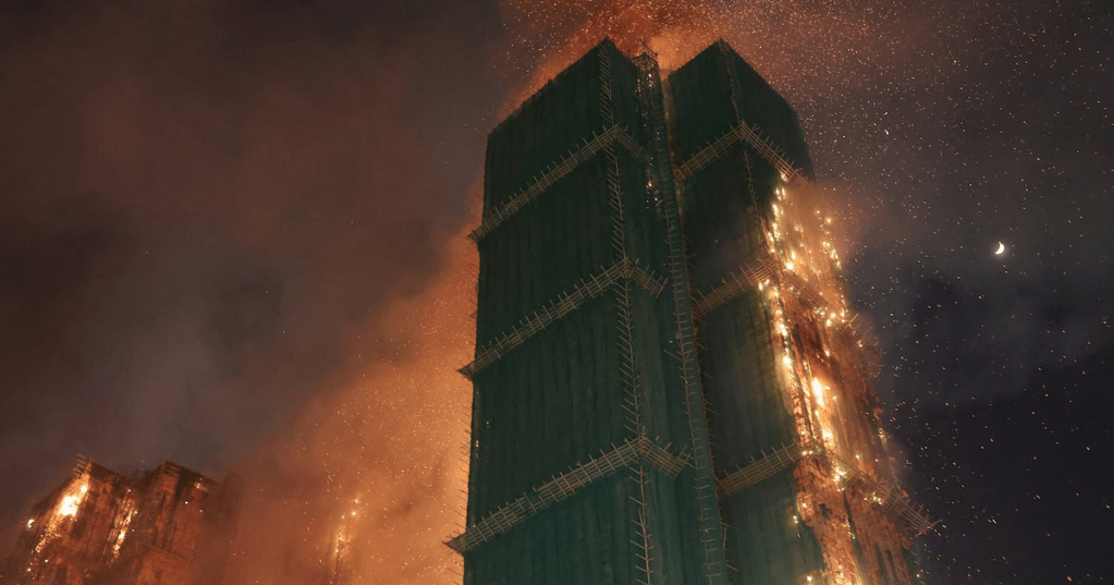 Fire burns bamboo scaffolding across multiple buildings at Wang Fuk Court housing estate, in Tai Po, Hong Kong, China, November 26. REUTERS/Tyrone Siu