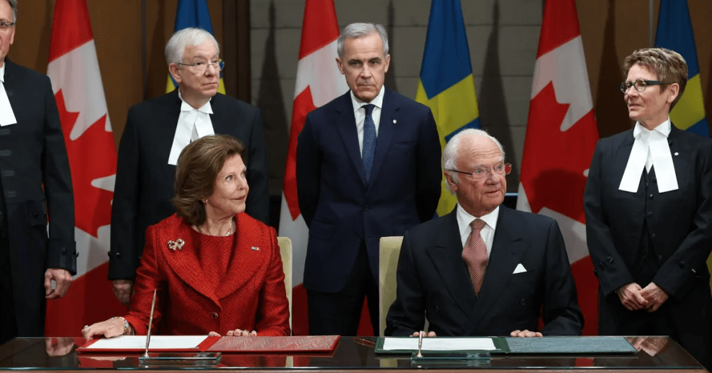 Mark Carney, Canada's prime minister, center, King Carl XVI Gustaf, right, and Queen Silvia of Sweden, left, during a welcome ceremony on Parliament Hill in Ottawa, Ontario, Canada on Nov. 18.Photographer: David Kawai/Bloomberg