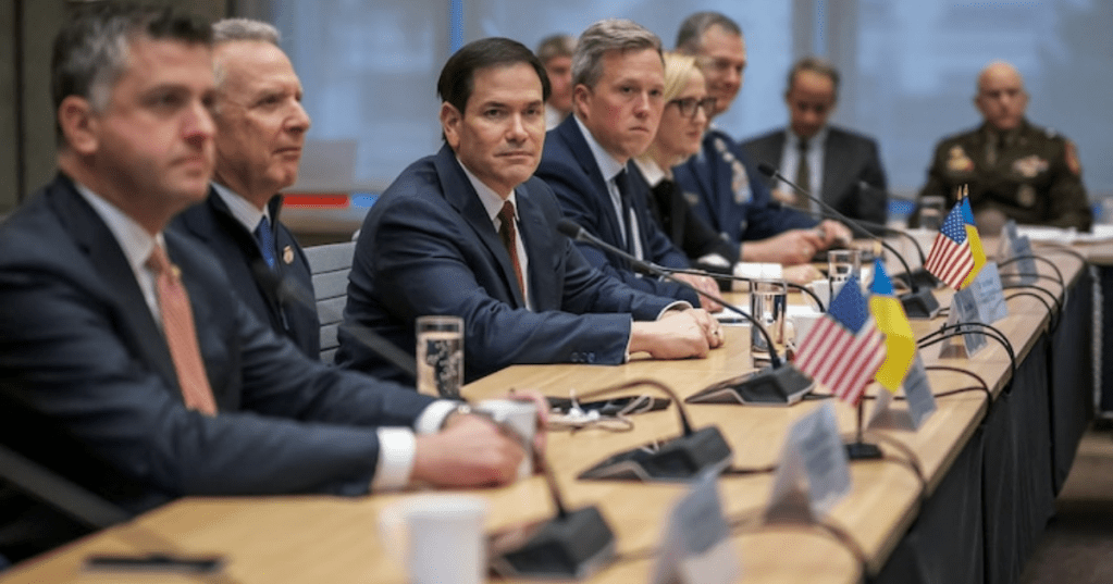 U.S. Secretary of State Marco Rubio (C), next to US special envoy Steve Witkoff (2nd L), faces the Ukrainian delegation during discussions on a U.S. plan to end the war in Ukraine at the U.S. Mission in Geneva, on Nov. 23, 2025. (Photo by Fabrice COFFRINI / AFP via Getty Images)