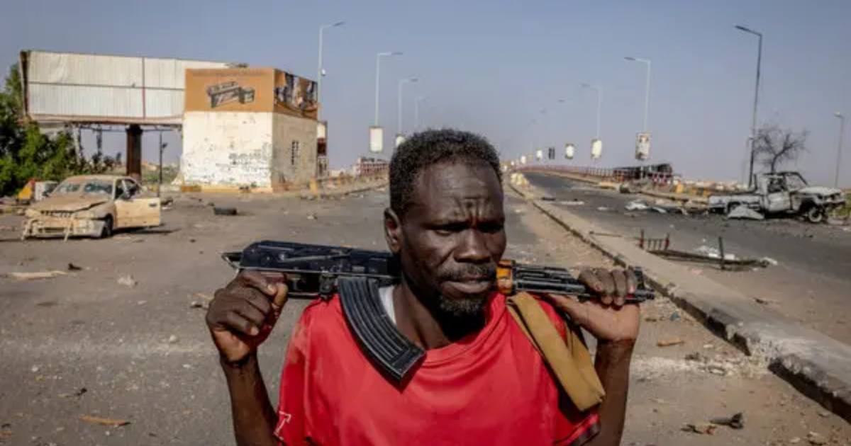 Walid Ahmed, a Sudanese army soldier, in front of the Manshia Bridge after the Rapid Support Forces retreated from much of Khartoum and the city was declared “free” by the head of the Sudanese military. (nytimes)