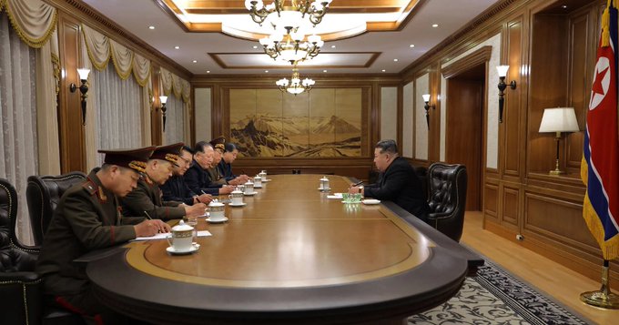 This picture, taken on September 26, 2025 and released by North Korea’s official Korean Central News Agency (KCNA), shows leader Kim Jong Un attending a consultation meeting on nuclear materials and nuclear weapons production with scientists and engineers [KCNA via/AFP]