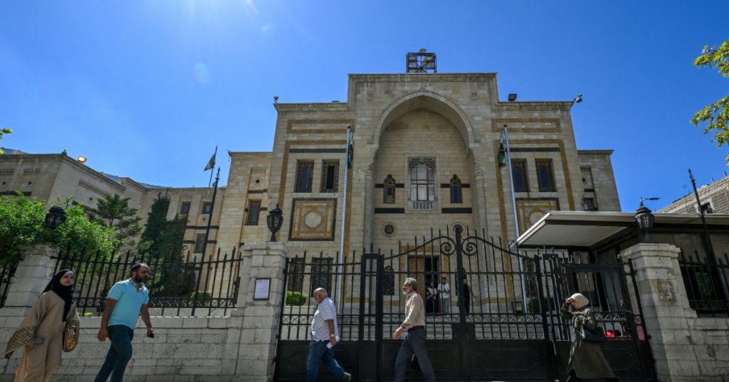 The Parliament building in Damascus. Some have welcomed the elections as a step toward democracy, but parts of the country will not be represented. Louai Beshara/Agence France-Presse — Getty Images