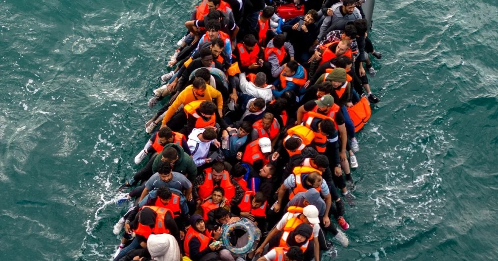People in an inflatable dinghy make their way towards the UK in the English Channel, 6 August, 2024. Photograph: Chris J Ratcliffe/Reuters