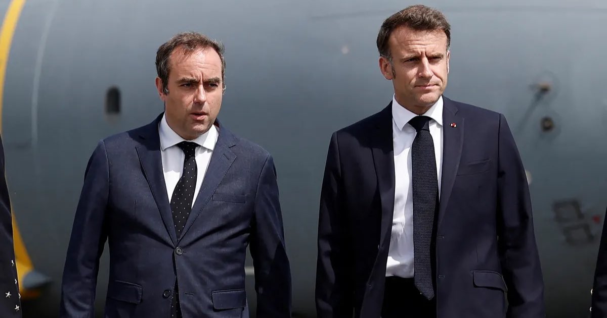 Sebastien Lecornu and French President Emmanuel Macron. Photographer: Benoit Tessier/AFP/Getty Images