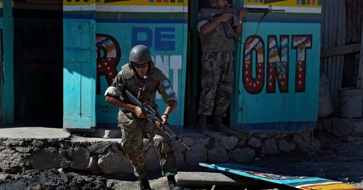 United Nations peacekeepers from Argentina attempting to clear the streets of armed gang members in Gonaïves, Haiti, in 2004. Chang W. Lee/The New York Times