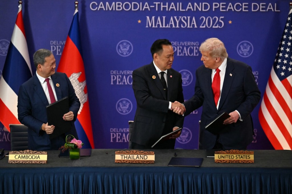 Cambodia’s Prime Minister Hun Manet (L) watches Thailand’s Prime Minister Anutin Charnvirakul and US President Donald Trump (R) shake hands on the sidelines of the 47th Association of Southeast Asian Nations Summit in Kuala Lumpur on October 26, 2025. — Photo by Agence France-Presse