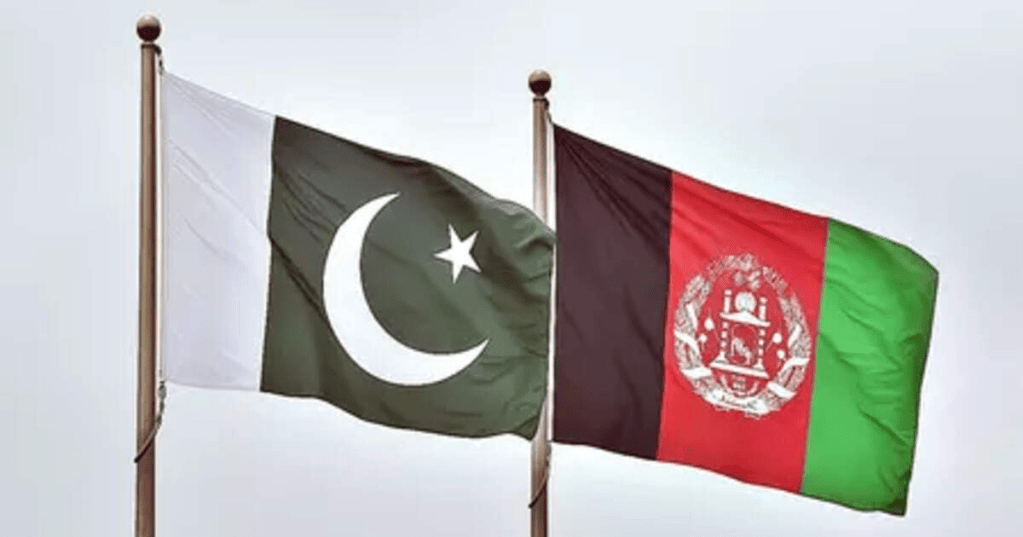 National flags of Pakistan and Afghanistan flying on flagpoles. - The Economic Times