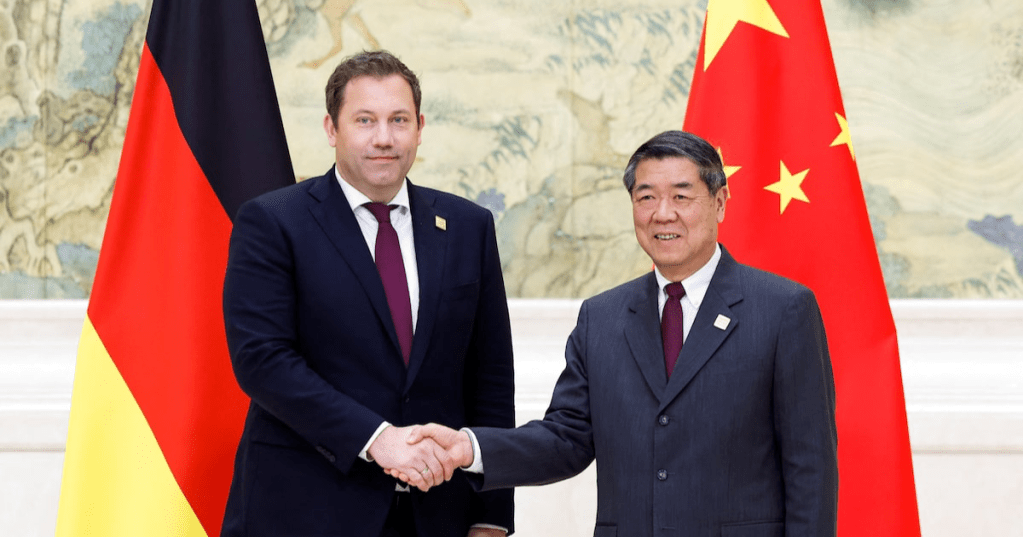 German Vice Chancellor and Finance Minister Lars Klingbeil and China’s Vice Premier He Lifeng shake hands during a high-level meeting at Diaoyutai State Guesthouse in Beijing, China, November 17, 2025. REUTERS/Maxim Shemetov/Pool