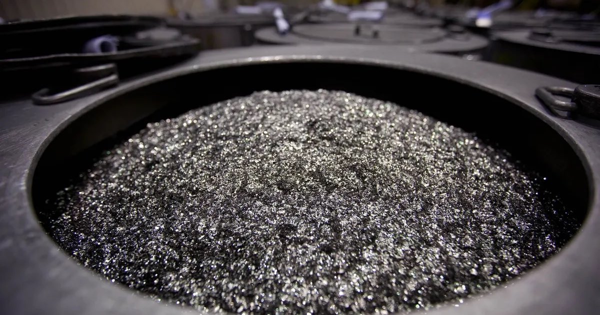 Annealed neodymium iron boron magnets in a barrel at a factory in Tianjin, China.Photographer: Doug Kanter